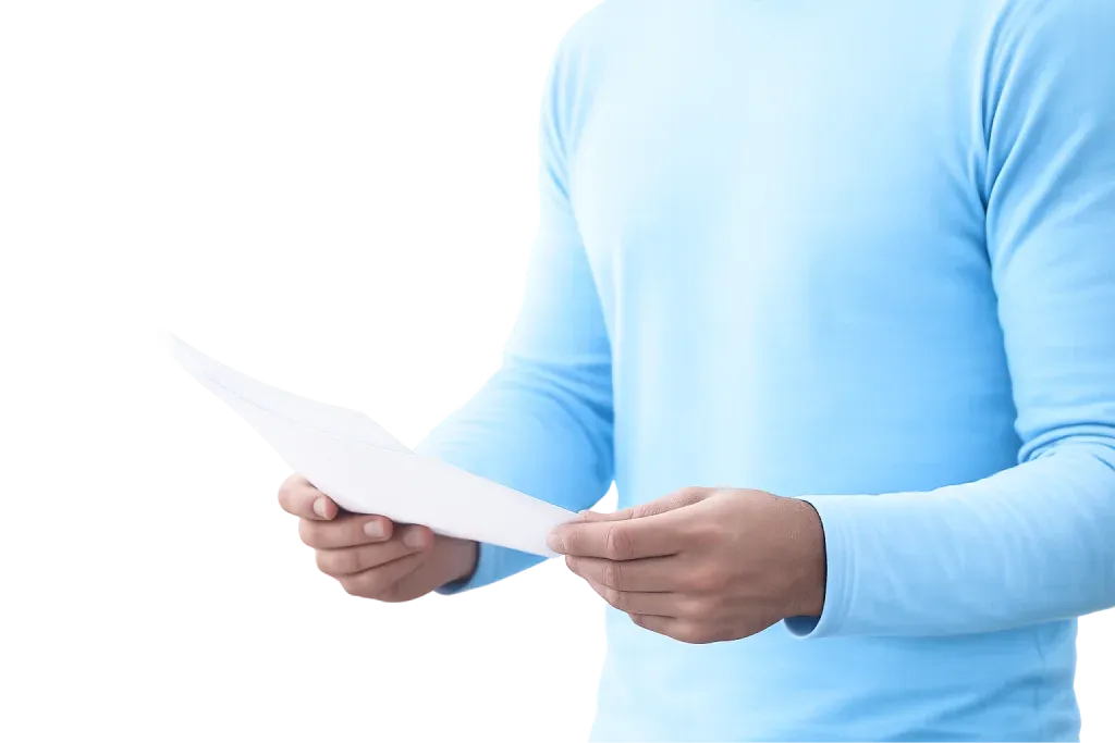 Patient holding the Clinicana lifetime guarantee certificate